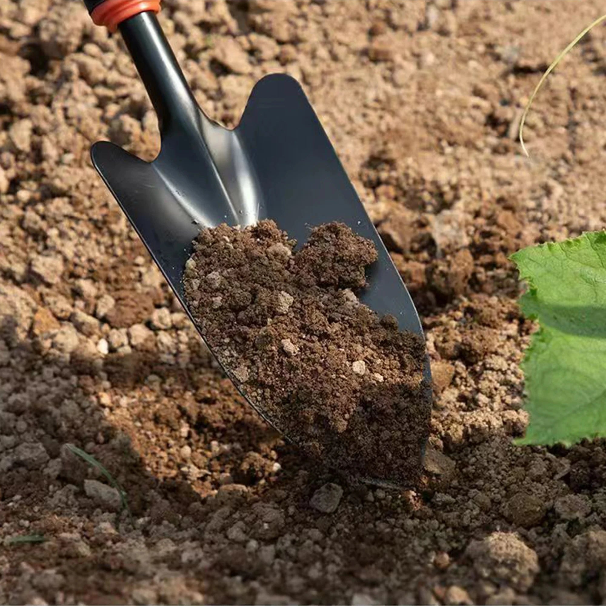 Metal Garden Trowel with Ergonomic Black Handle and Orange Trim